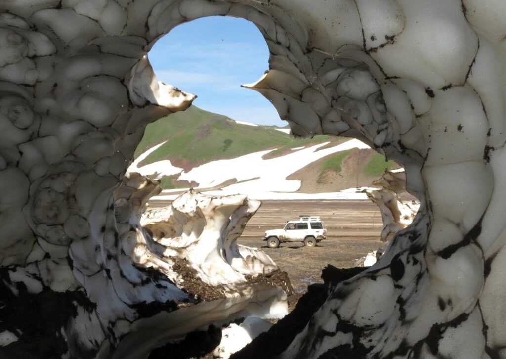 summer, sneznik, hole, snow cave, mountain plateau, gully, stream, snow, road, dirt, beautiful flowers, drifts, car, suv, mountains, kamchatka, nature, river, landscape, highlangs, travelling, flower background, traveling, tourism, flowers, sunset, car wallpapers, evening sky, flower wallpaper, summer day, atv, cave
